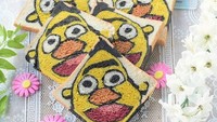 Juga ada roti tawar yang ditengah-tengah lapisannya dibuat bergambar karakter. Yang satu ini dengan dominasi warna orange berakarakter boneka Ernie. Foto: Instagram @ojiobachanok