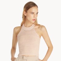 Halter TopAtasan lain yang cocok dipadukan dengan jeans adalah halter top ala 90an. Item yang belakangan jadi tren ini bisa dipakai sendirian atau sebagai dalaman juga cocok untuk berbagai model jeans. Purpose Crochet Halter Tank warna Blush seharga Rp 249 ribuan ini cocok dijadikan pilihannya. Foto: Pomelo