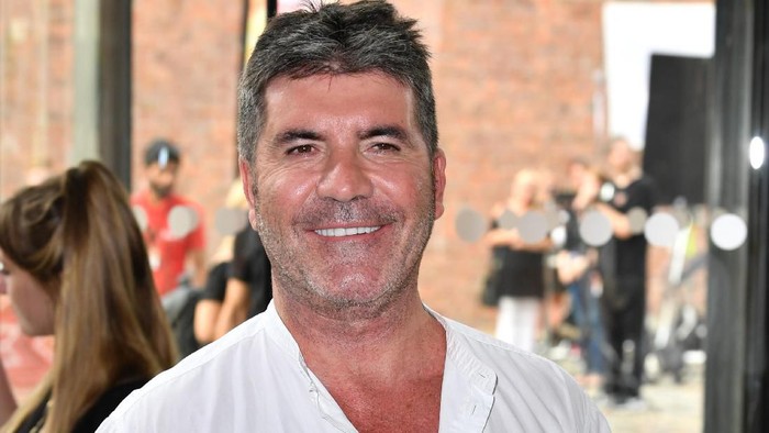 698561082 LIVERPOOL, ENGLAND - JUNE 20: Simon Cowell attends the first day of auditions for the X Factor at The Titanic Hotel on June 20, 2017 in Liverpool, England. (Photo by Anthony Devlin/Getty Images)