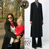 Selain dress, Nagita Slavina juga mengoleksi outer yang harganya tidaklah murah. Salah satunya coat dari label Marni ini. Coat panjang berwarna hitam yang dipakainya saat liburan ini harganya mencapai US$ 3.100 atau sekitar Rp 44 juta. Foto: Instagram @ fashion_nagitaslavina