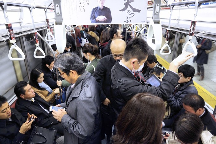 Passengers ride a crowded metro train in Tokyo. With more than 3.1 billion annual passenger rides, Tokyo subway system is the busiest worldwide.