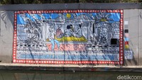 Mural yang menceritakan tentang pentingnya menjaga lingkungan (Randy/detikcom) 