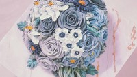 Tema buket bunga juga diusung cake yang satu ini. Seluruh permukaan cake dilapisi dengan butter cream yang berbentuk bunga. Cantik! Foto: instagram