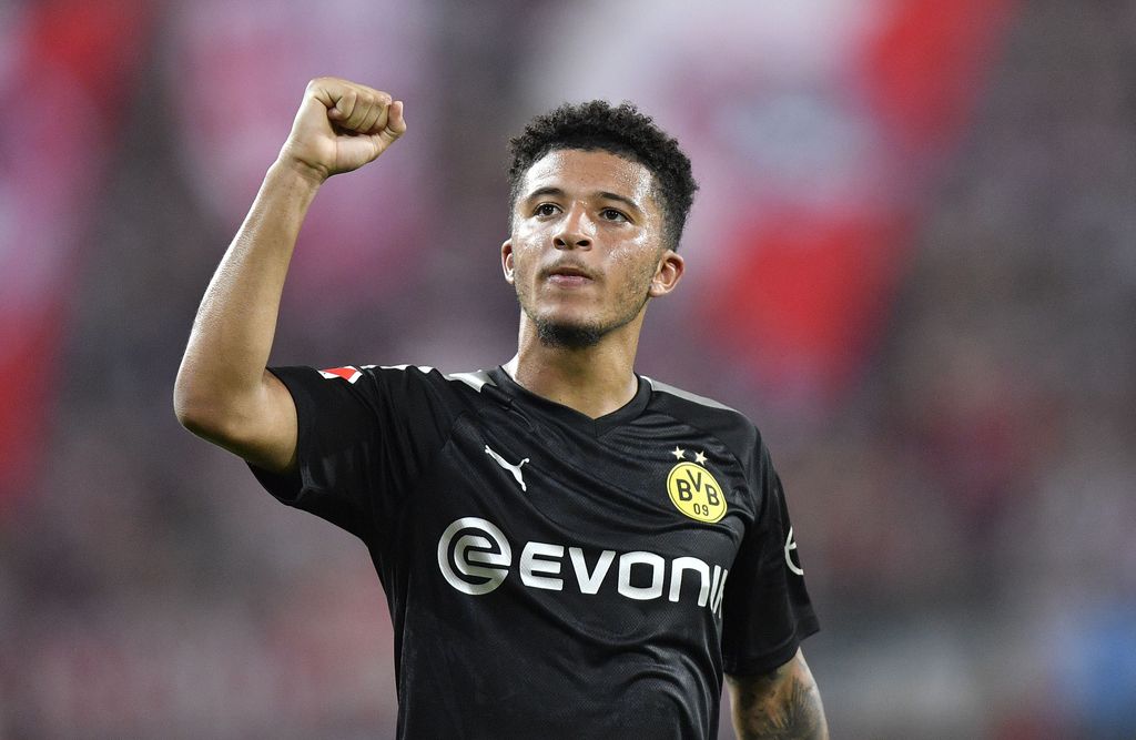 Jadon Sancho Dortmund's Jadon Sancho celebrates at the end of the German Bundesliga soccer match between FC Cologne and Borussia Dortmund in Cologne, Germany, Friday, Aug.23, 2019. Borussia won 3:1. (AP Photo/Martin Meissner)