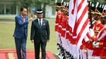 Senyum Jokowi Saat Terima Kedatangan Raja Malaysia di Istana Bogor