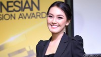 Apalagi saat dirinya tersenyum ke arah kamera. Pool/Noel/detikFoto.