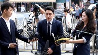 Pada hari itu, personil BIG BANG itu dipanggil atas kasus judi ilegal yang dilakukannya bersama Yang Hyun Suk. Chung Sung-Jun/Getty Images