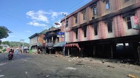 Begini penampakan terkini suasana di Jayapura, Jumat (30/8/2019). Tampak sebuah bangunan hangus terbakar pascarusuh pada Kamis (29/8).