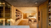 Desain interior ruang tamu di Terreno House ini dilengkapi dengan perabotan dari kayu. Istimewa/Dok. Inhabitat.