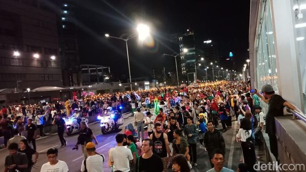 Pawai obor Jakarta Muharram Festival. 