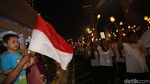 Aksi Ribuan Peserta Pawai Obor Long March dari Monas ke Bundaran HI