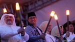 Aksi Ribuan Peserta Pawai Obor Long March dari Monas ke Bundaran HI