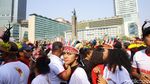 Menari dan Bernyanyi Bareng Masyarakat Papua di CFD