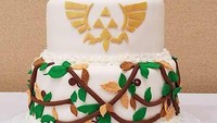 Meski hanya dua tingkatan, tetapi tidak mengurangi kesan mewah sedikit pun dari kue ini. Apalagi hiasan detail di sisi kue. Lengkap dengan hiasan berkarakter Legend of Zelda . Foto: Istimewa