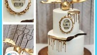 Kue pengantin yang satu ini sangat mewah karena warnanya ada sentuhan gold di antara warna putih yang mendominasi. Foto: Istimewa