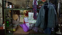 Pemerintah Hong Kong memprediksi rumah kandang ini pertama kali muncul pada 1950 saat pendatang dari China lagi banyak-banyaknya. Foto: Getty Images