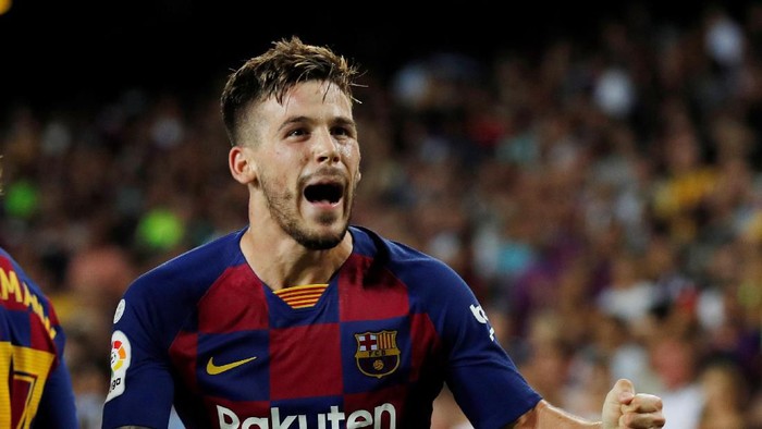 Soccer Football - La Liga Santander - FC Barcelona v Real Betis - Camp Nou, Barcelona, Spain - August 25, 2019   Barcelonas Carles Perez celebrates scoring their third goal   REUTERS/Albert Gea