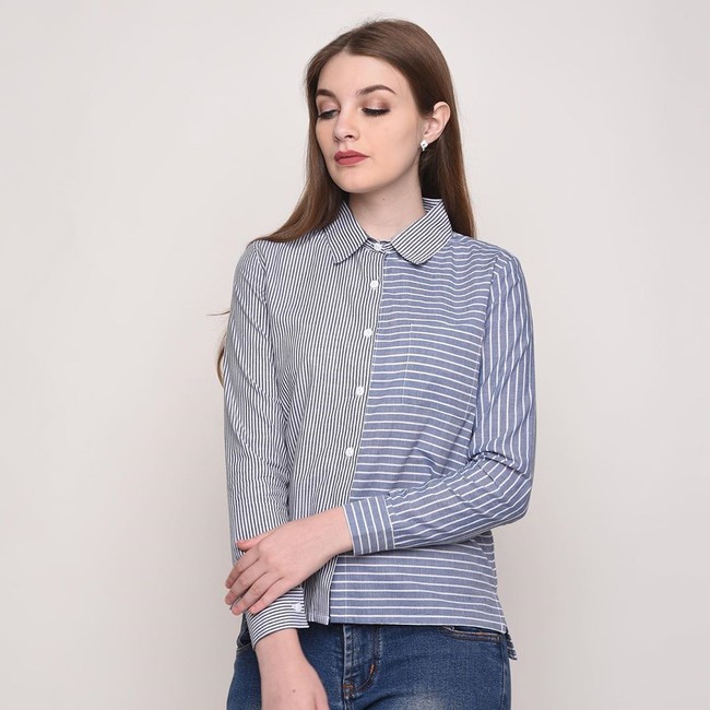 Kemeja lengan panjang sering jadi andalan para mahasiswa saat kuliah. Online shop Missca.id menawarkan opsinya. Kemeja kinanti dengan perpaduan dua motif garis dan bermaterial katun ini bisa dimiliki seharga Rp 99 ribu. Foto: Instagram