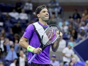 Kalahkan Federer dalam Duel 5 Set, Dimitrov ke Semifinal AS Terbuka