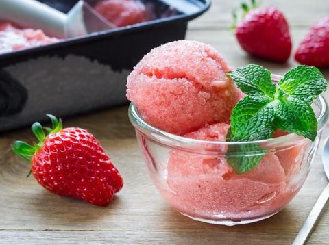 Fruit strawberry sorbet with fresh berries on rustic background