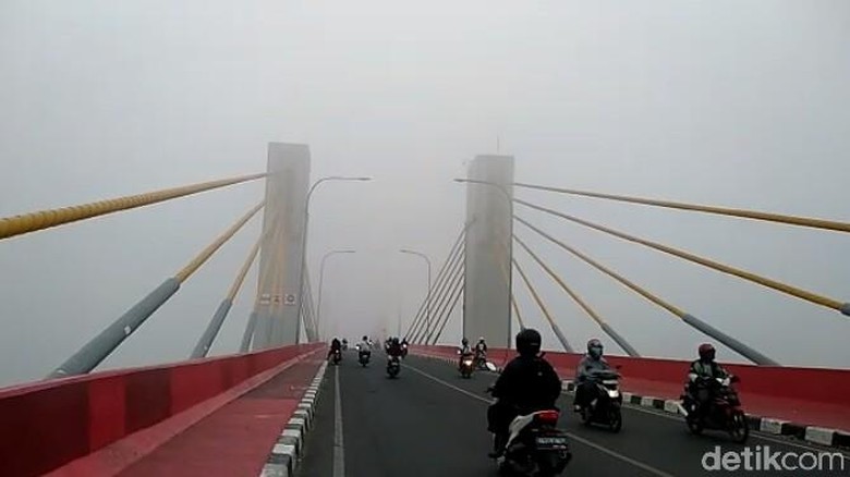 Titik Api Terdeteksi di Sumsel, Palembang Diselimuti Asap Titik Api Terdeteksi di Sumsel, Palembang Diselimuti Asap