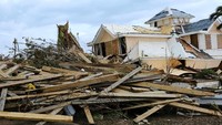 Potret salah satu rumah yang rusak berat usai dihantam Badai Dorian yang menghantam Kepulauan Bahama. Dante Carrer/Reuters.