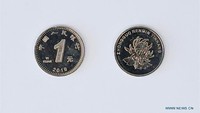 Edisi baru renminbi ini dipercaya akan mendorong peningkatan ekstensif oleh pengguna mesin pribadi. Xinhua/Chen Yehua.