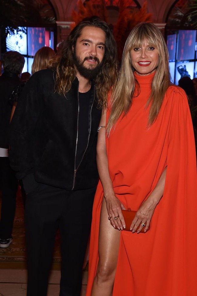 Kisah cinta antara Heidi dan Tom sempat menjadi sorotan lantaran perbedaan umur yang jauh. Heidi 16 tahun lebih tua dari Tom. (Foto: Getty Images)