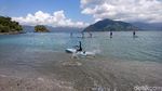 Keseruan Parade Stand Up Paddle di Teluk Prigi Trenggalek
