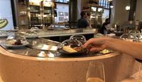 Selain Sushi, Kini Keju Disajikan di Atas Conveyor Belt 