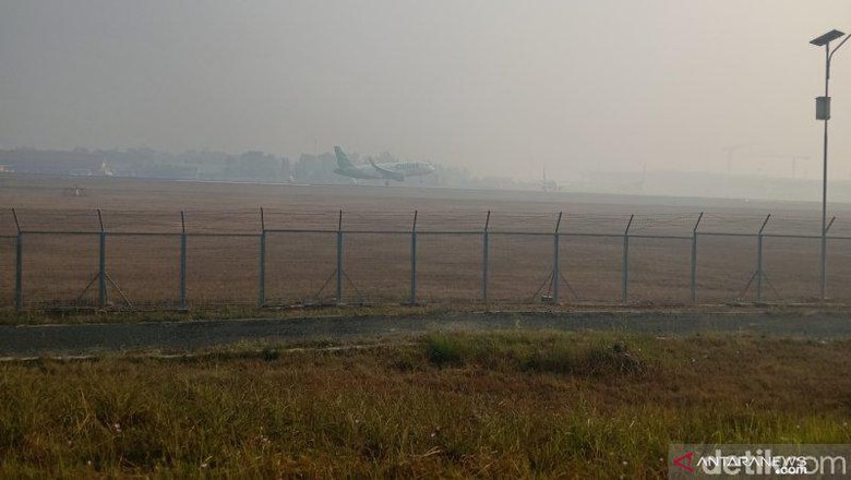 Kabut Asap Bikin Penerbangan di Banjarmasin Terganggu Kabut Asap Bikin Penerbangan di Banjarmasin Terganggu