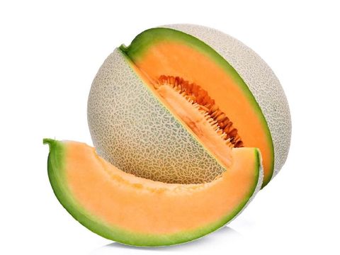 slice of japanese melons, green melon or cantaloupe melon with seeds isolated on white background