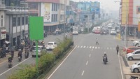 Tak hanya Kalimantan Selatan, kawasan Pontianak yang berada di Kalimantan Barat, turut merasakan imbas kabut asap akibat kebakaran hutan dan lahan. Antara Foto/Jessica Helena Wuysang.