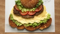 Cheeseburger tidak disantap habis. Tetapi oleh Edgar dirangkai jadi gaun mewah berlapis-lapis cantik.Foto: istimewa