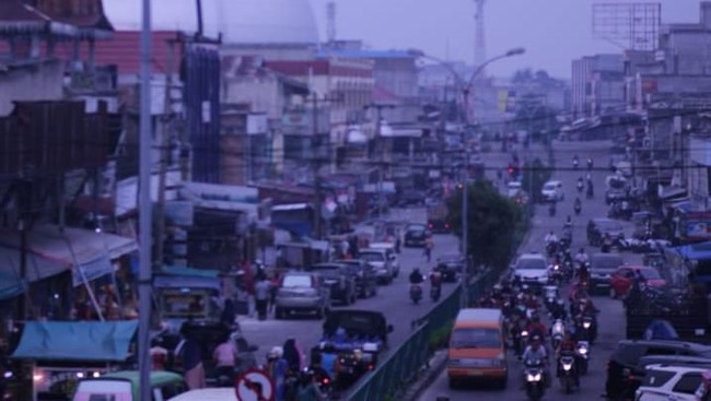 Curhat Pedagang Dikepung Pekatnya Kabut Asap