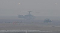 Helikopter waterbombing parkir di Lapangan Udara (Lanud) Sri Mulyono Herlambang yang bersebelahan dengan Bandara Sultan Mahmud Badaruddin II Palembang, Sumsel, Senin (16/9/2019). ANTARA FOTO/Feny Selly.