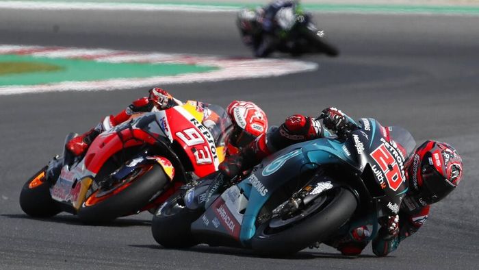 Pebalap Yamaha Petronas SRT, Fabio Quartararo, dipuji oleh Marc Marquez mirip Jorge Lorenzo. (Foto: Antonio Calanni / AP Photo) Pebalap Yamaha Petronas SRT, Fabio Quartararo, dipuji oleh Marc Marquez mirip Jorge Lorenzo. (Foto: Antonio Calanni / AP Photo)