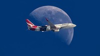 Marston mengambil foto Qantas Boeing 737 ini. Rekan dekatnya, seorang pramugari Qantas, sedang berada di atas pesawat itu. (Foto: Michael Marston ePixel Images/CNN)