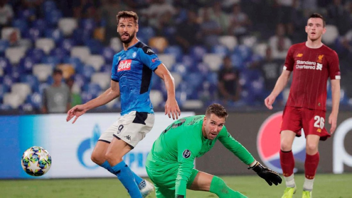 Fernando Llorente tuntaskan dendamnya ke Liverpool. (Foto: Ciro De Luca/Reuters)