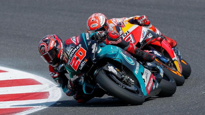 Motorcycling - MotoGP - San Marino Grand Prix - Misano World Circuit Marco Simoncelli, Misano Adriatico, Italy - September 15, 2019  Petronas Yamaha SRTs Fabio Quartararo and Repsol Hondas Marc Marquez in action during the race  REUTERS/Rafael Marrodan/Photocall3000