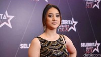 Bagaimana nih penampilan Anya menurut Anda? Pool/Noel/detikFoto.