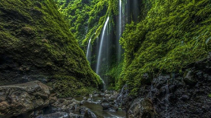 Indonesia famous place attraction for tourist Madakaripura Waterfall the tallest waterfall in Java and the second tallest waterfall in Indonesia.