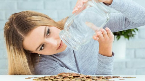Couple is watching TV in the bed and the wife is unhappy with the channel