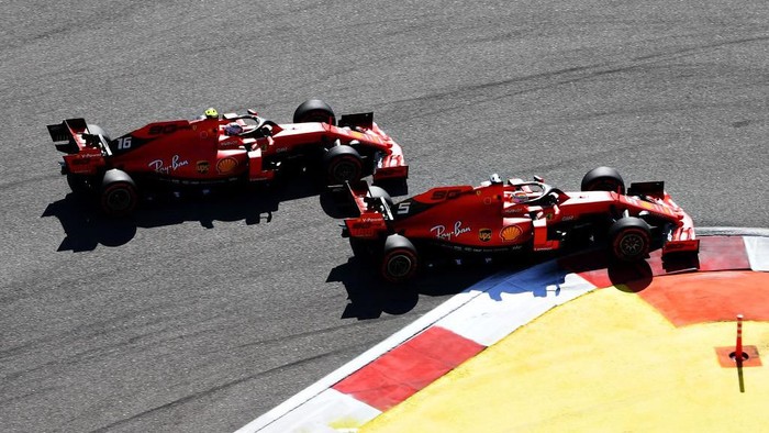 SOCHI, RUSSIA - SEPTEMBER 29: Sebastian Vettel of Germany driving the (5) Scuderia Ferrari SF90 and Charles Leclerc of Monaco driving the (16) Scuderia Ferrari SF90 battle for position at the start during the F1 Grand Prix of Russia at Sochi Autodrom on September 29, 2019 in Sochi, Russia. (Photo by Clive Mason/Getty Images)