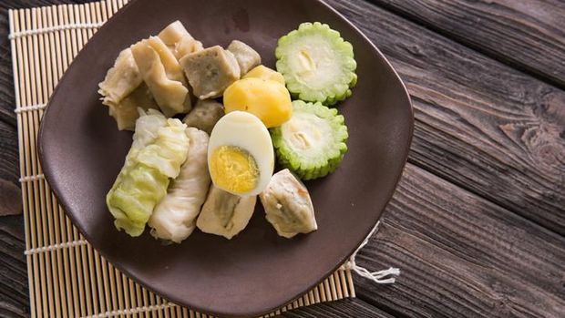 siomay. traditional indonesian food with peanut sauce. dumpling