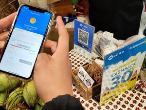Seluruh Merchant DANA 100% Gunakan QRIS