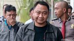 Ekspresi Bupati Lampung Utara Saat Tiba di KPK