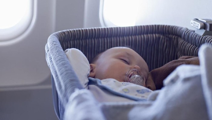 Ilustrasi bayi di pesawat