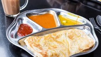 Roti canai memang khas India, tapi jangan lupa bahwa orang India banyak yang bermukim di Malaysia. Nikmati roti canai dengan saus kari yang khas. Kari yang disediakan seperti kari ayam, ikan, dan kacang-kacangan. Foto: iStock