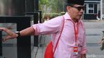 Rizal Djalil Gendong Tas Merah di KPK